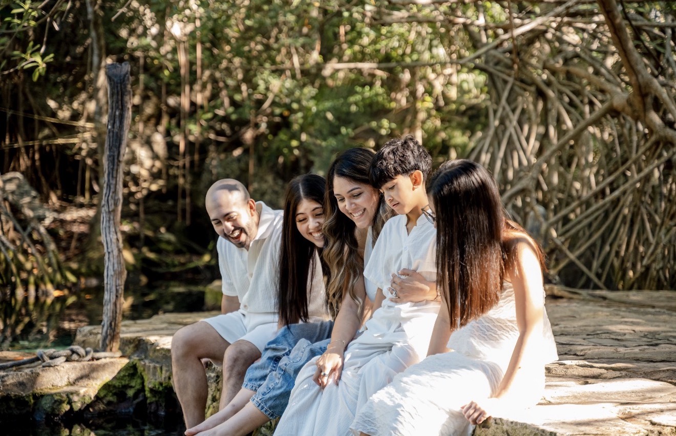 Creator with her family outdoors